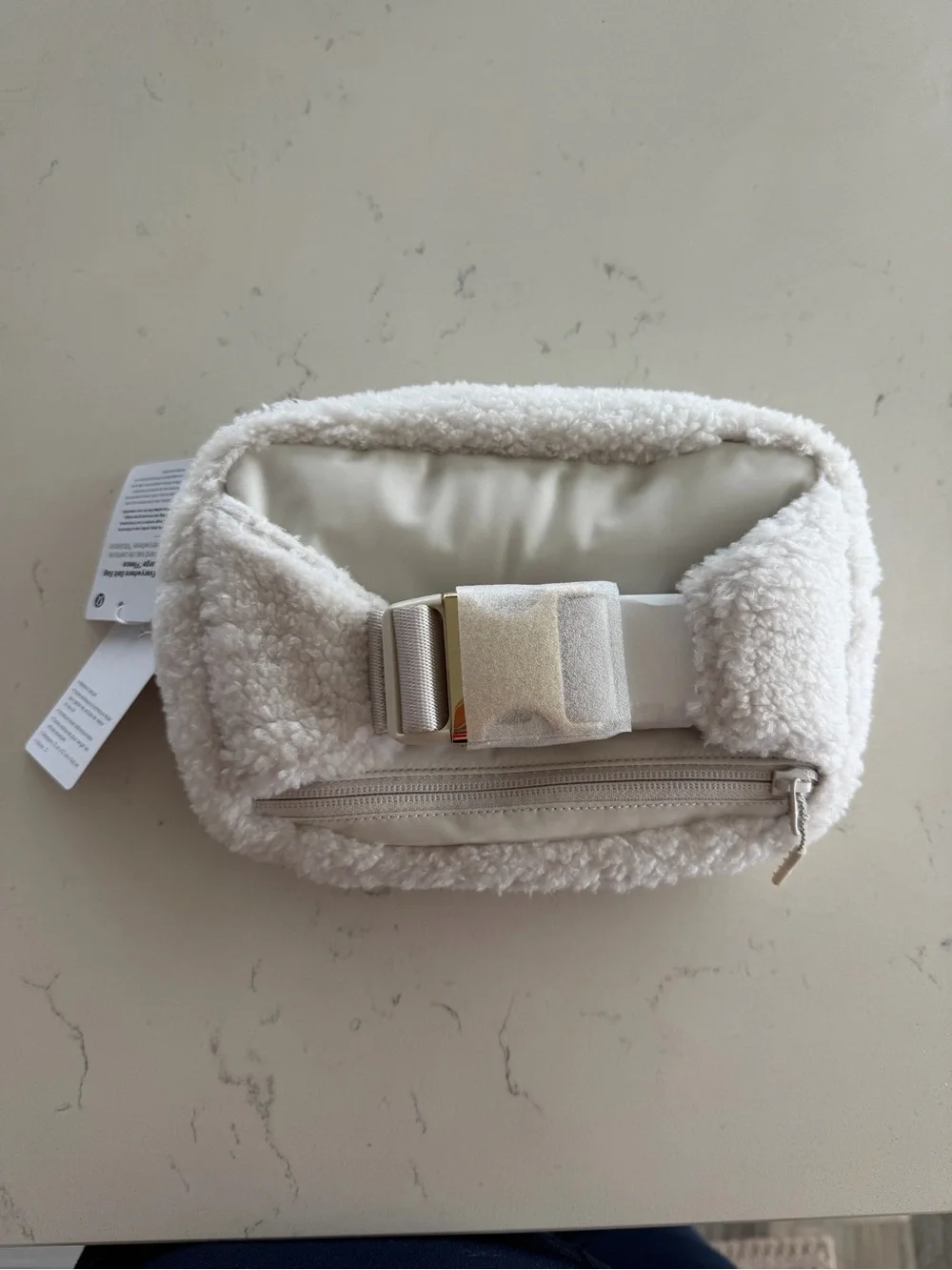 New lululemon athletica Cream Sherpa Pouch with Gold Accents